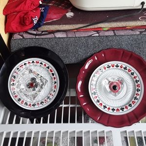 A pair of glass garden flowers